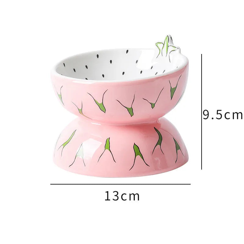 Ceramic raised cat bowl with tilted design and colourful fruit pattern