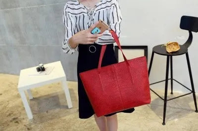 European simple fashion shoulder handbag for women in black and grey colours.