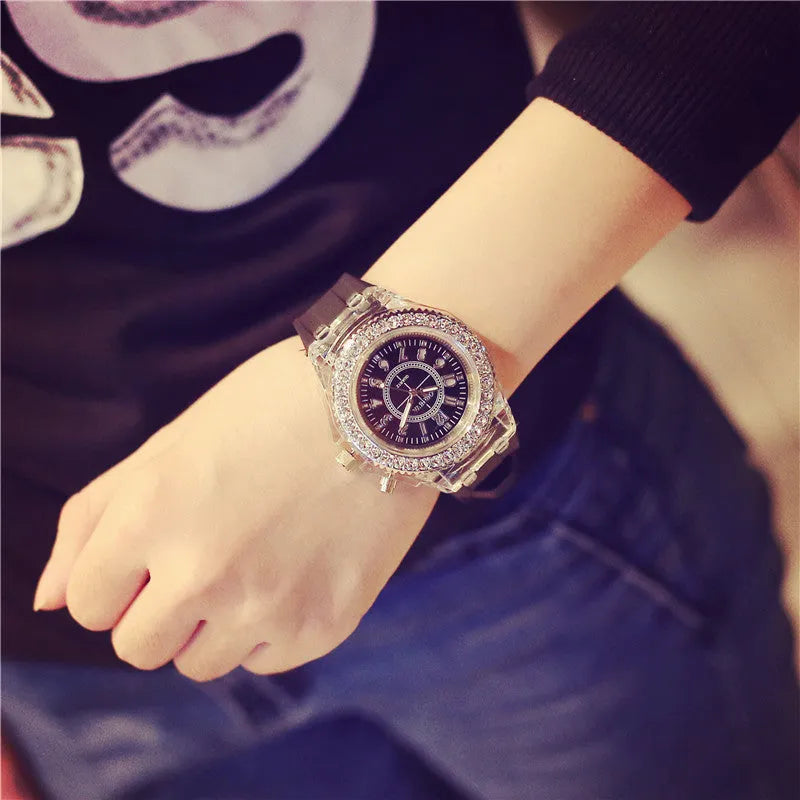 Women's LED luminous quartz watch with round dial, silicone strap, and luminous display features