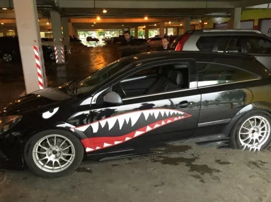 Large shark graphic car body sticker on a vehicle door, available in two style options.