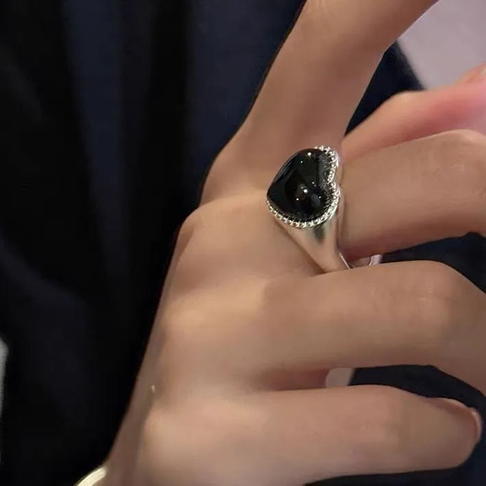 Adjustable sterling silver ring with heart-shaped black agate stone and open mouth design