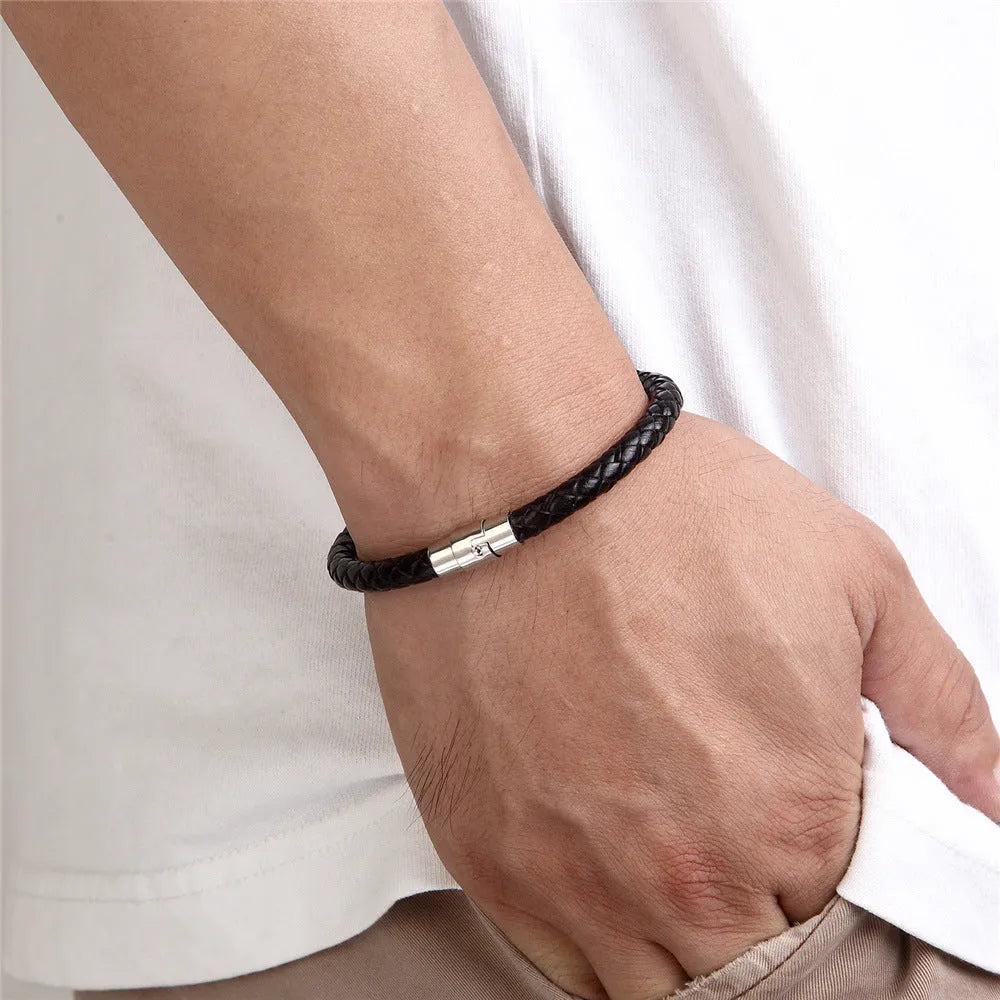 Men's geometric titanium steel bracelet with a magnetic clasp on a wrist.