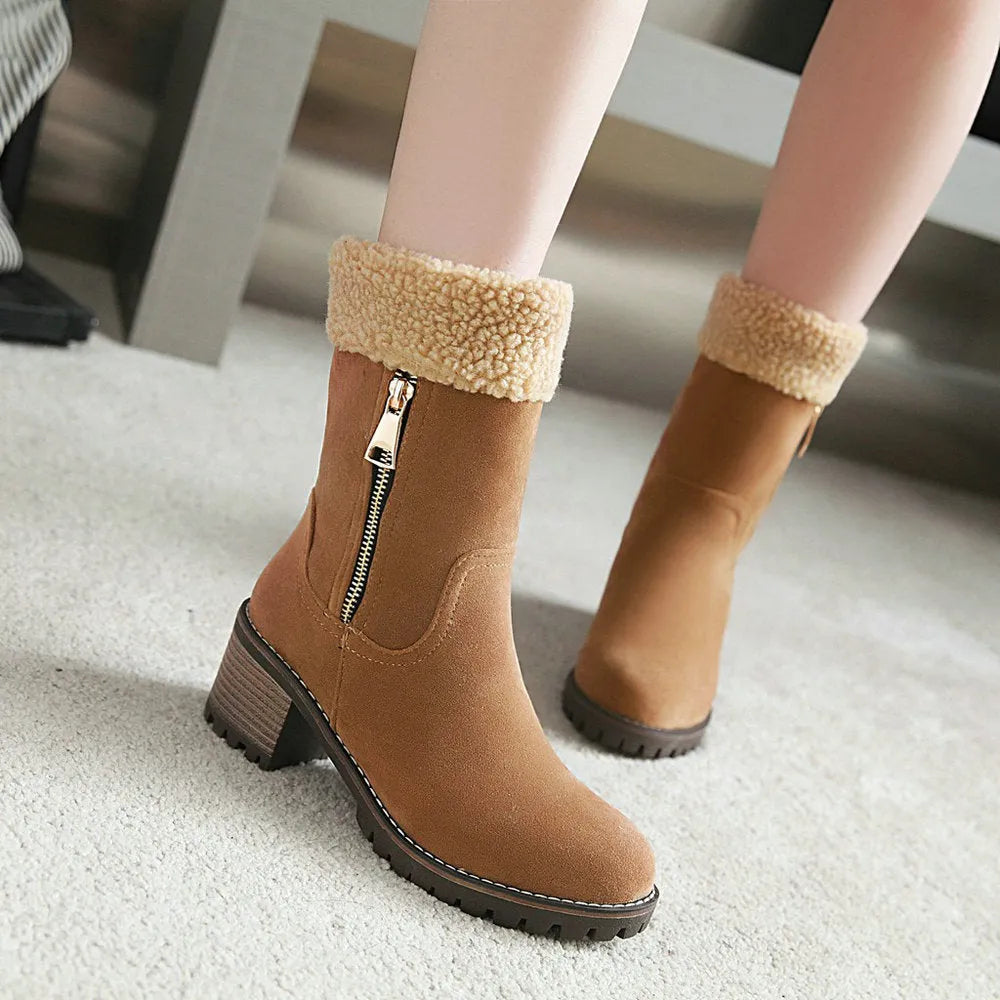 Snow boots in black, grey, green, or orange with a short plush lining and rubber insole