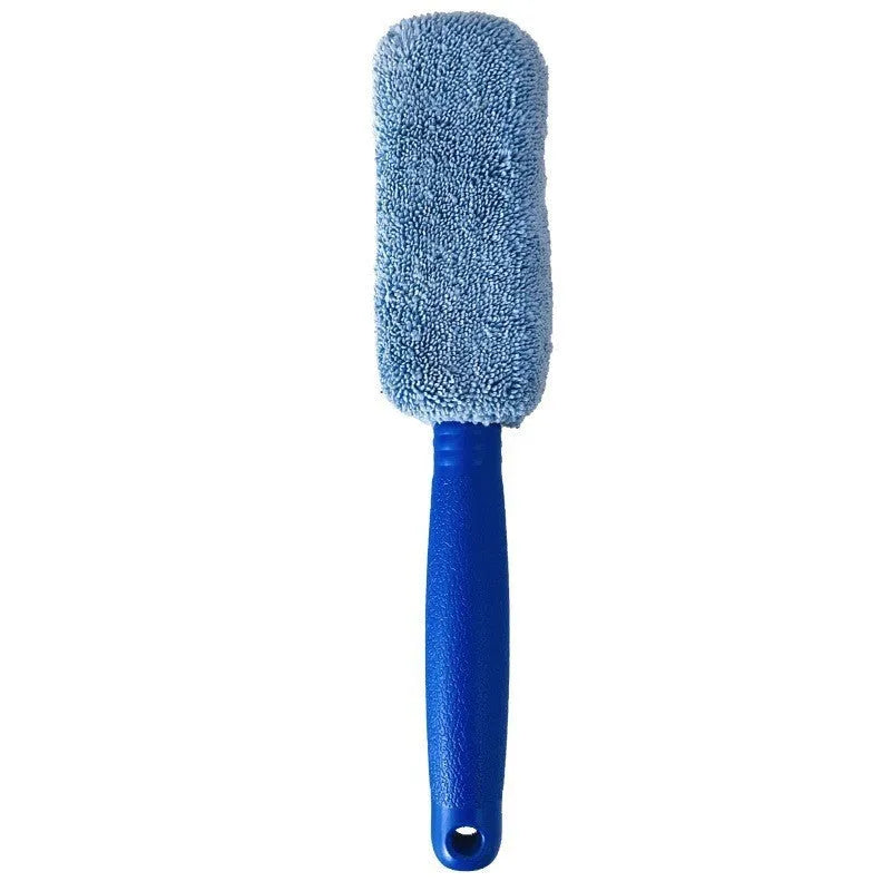 Blue long-handled microfiber brush for cleaning car tyres and wheels on a grey background.