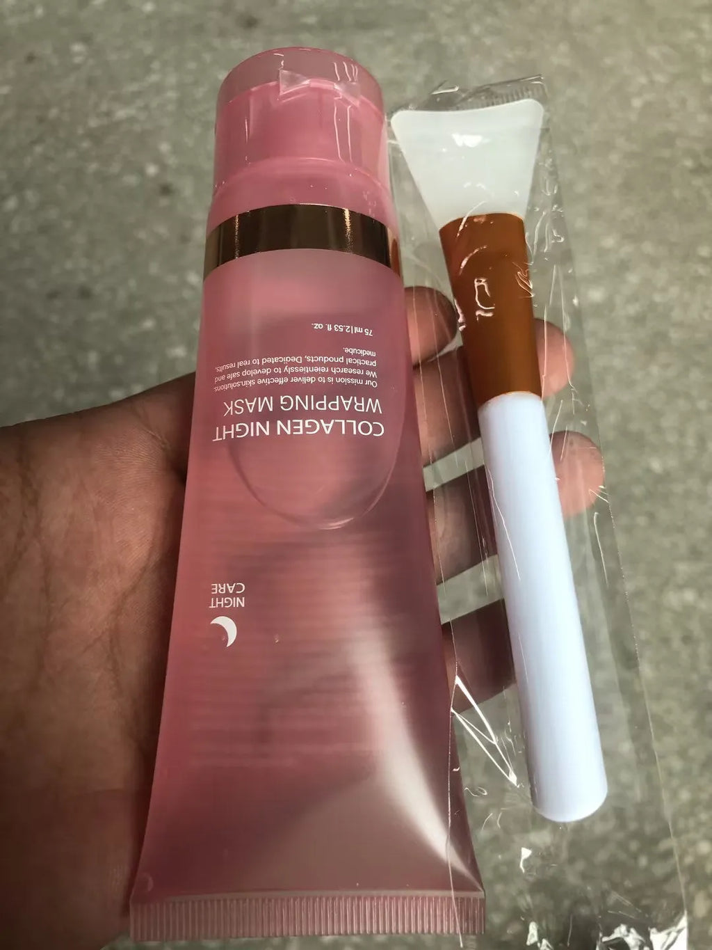 75ml bottle of collagen face night mask with application brush for evening skin care.