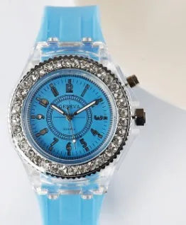 Women's LED luminous quartz watch with round dial, silicone strap, and luminous display features