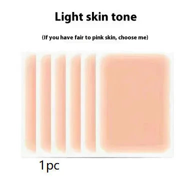 Tattoo cover patch kit with applicator brush for concealing birthmarks and tattoos in skin-coloured shades.