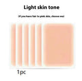 Tattoo cover patch kit with applicator brush for concealing birthmarks and tattoos in skin-coloured shades.