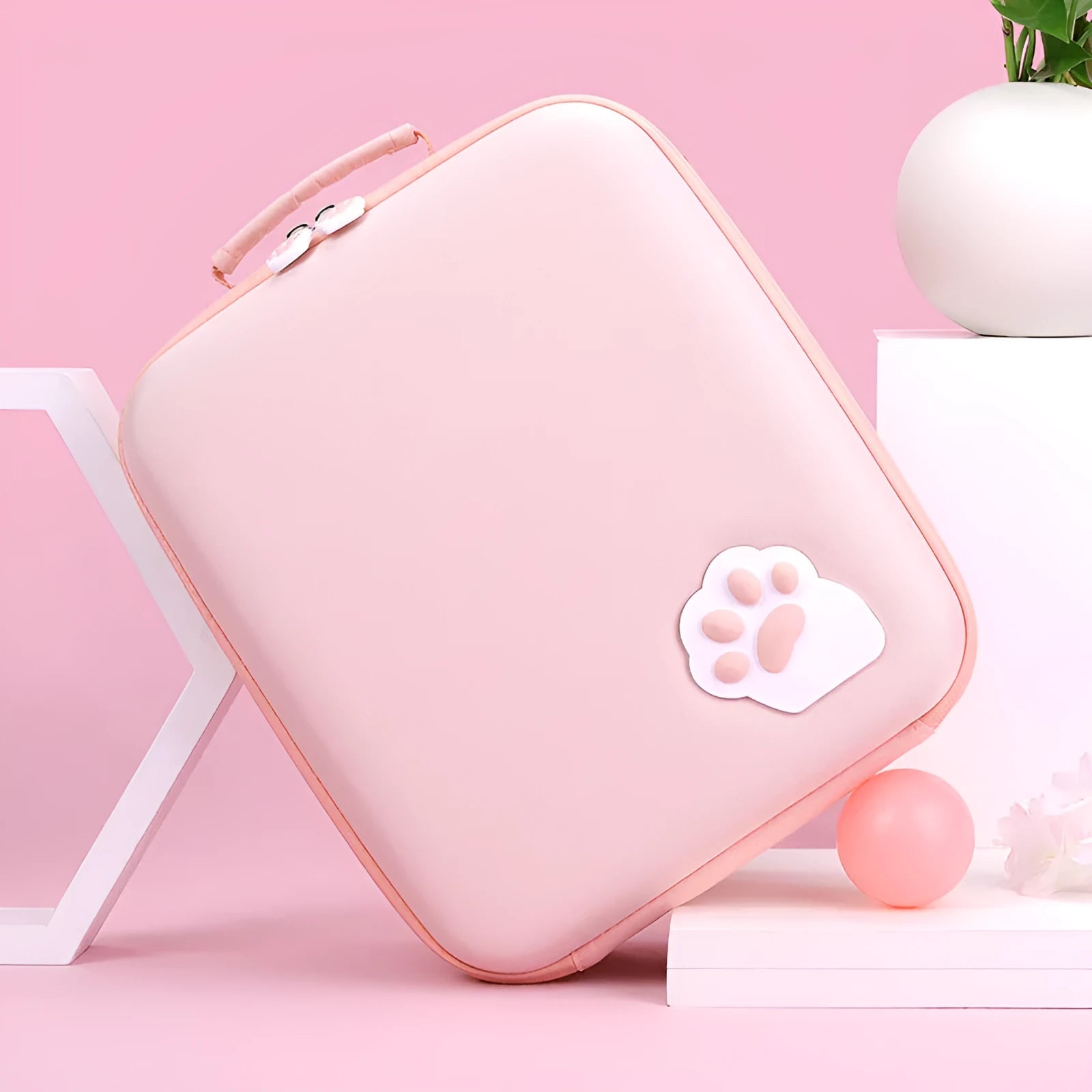 Nintendo Switch cat claw storage bag in pink showing game cartridge slots and shoulder strap