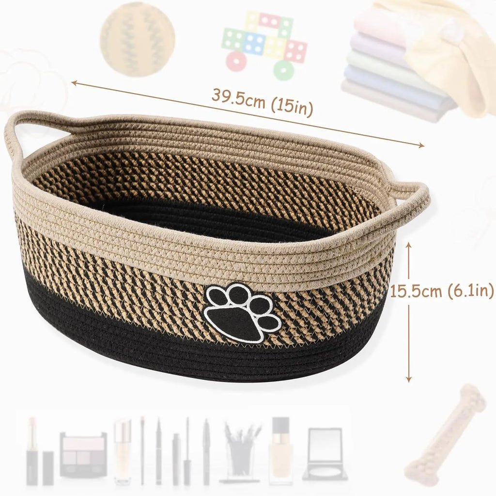 Light beige handmade cotton rope woven storage basket with wooden accents and handles.