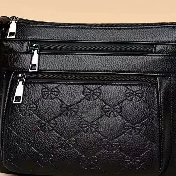 Butterfly black women's shoulder messenger bag with horizontal square shape and crossbody strap