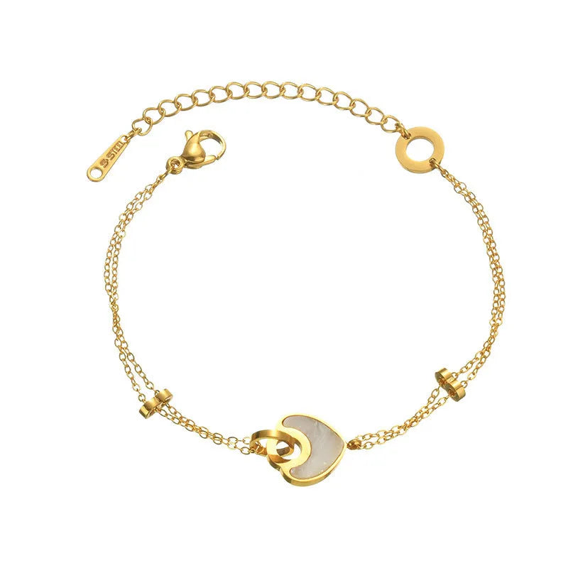 Stainless steel and resin bracelet for women with a double-layered heart-shaped charm.