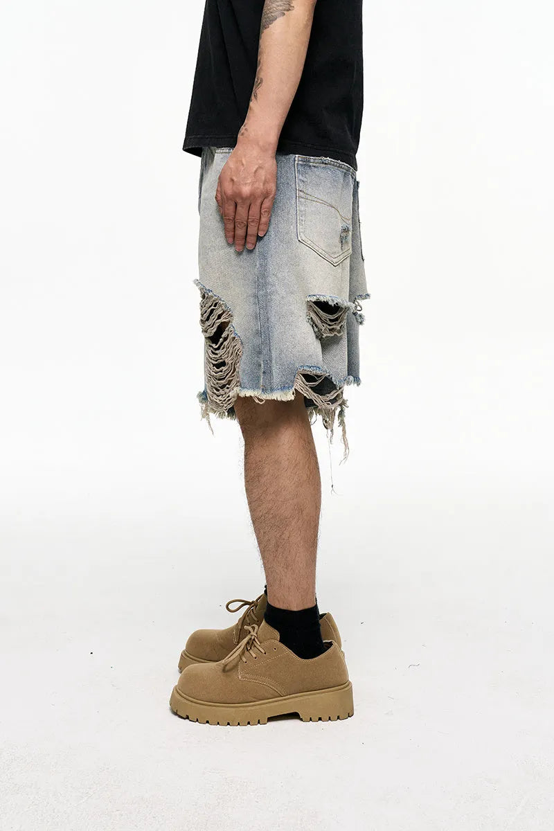 Men's light blue denim shorts with baggy wide leg cut and retro washed finish