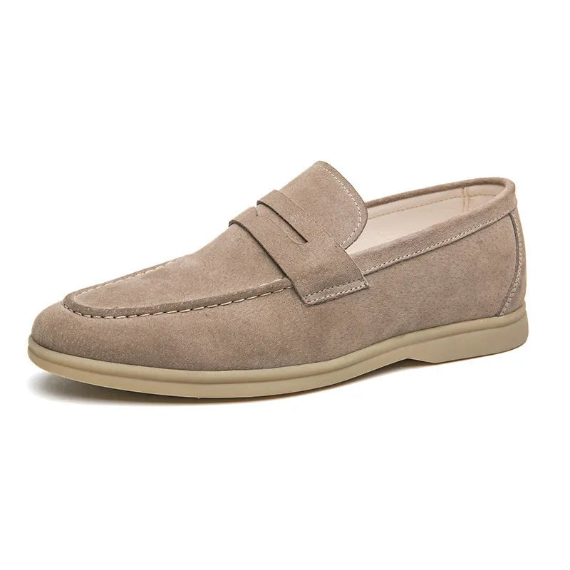 Men's black slip-on leather casual shoes with round toe and a mid-height rubber sole.