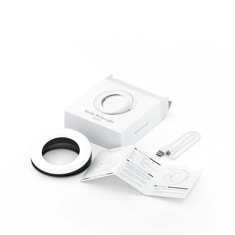 Compact black selfie ring light for smartphone photography with adjustable brightness settings