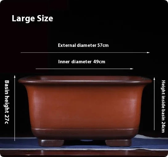 Large purple clay Chinese style flower pot for indoor bonsai or plants.