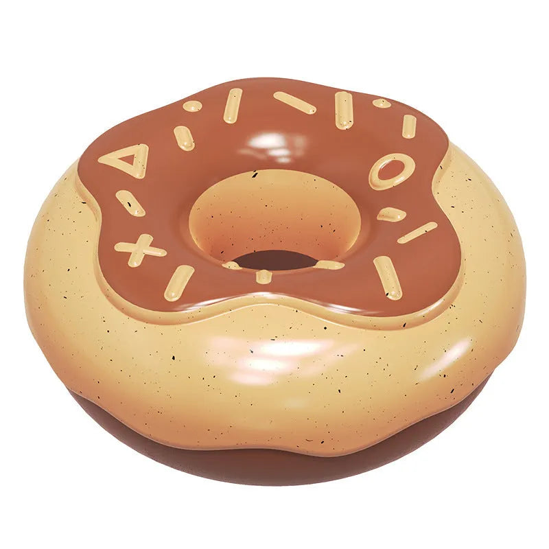 Pink donut-shaped dog chew toy with textured surfaces for dental cleaning