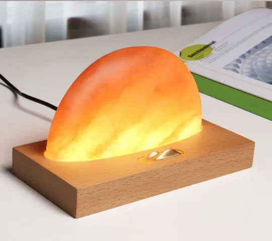 Sunrise Oriental natural crystal salt lamp with beech wood base and integrated wireless phone charging pad
