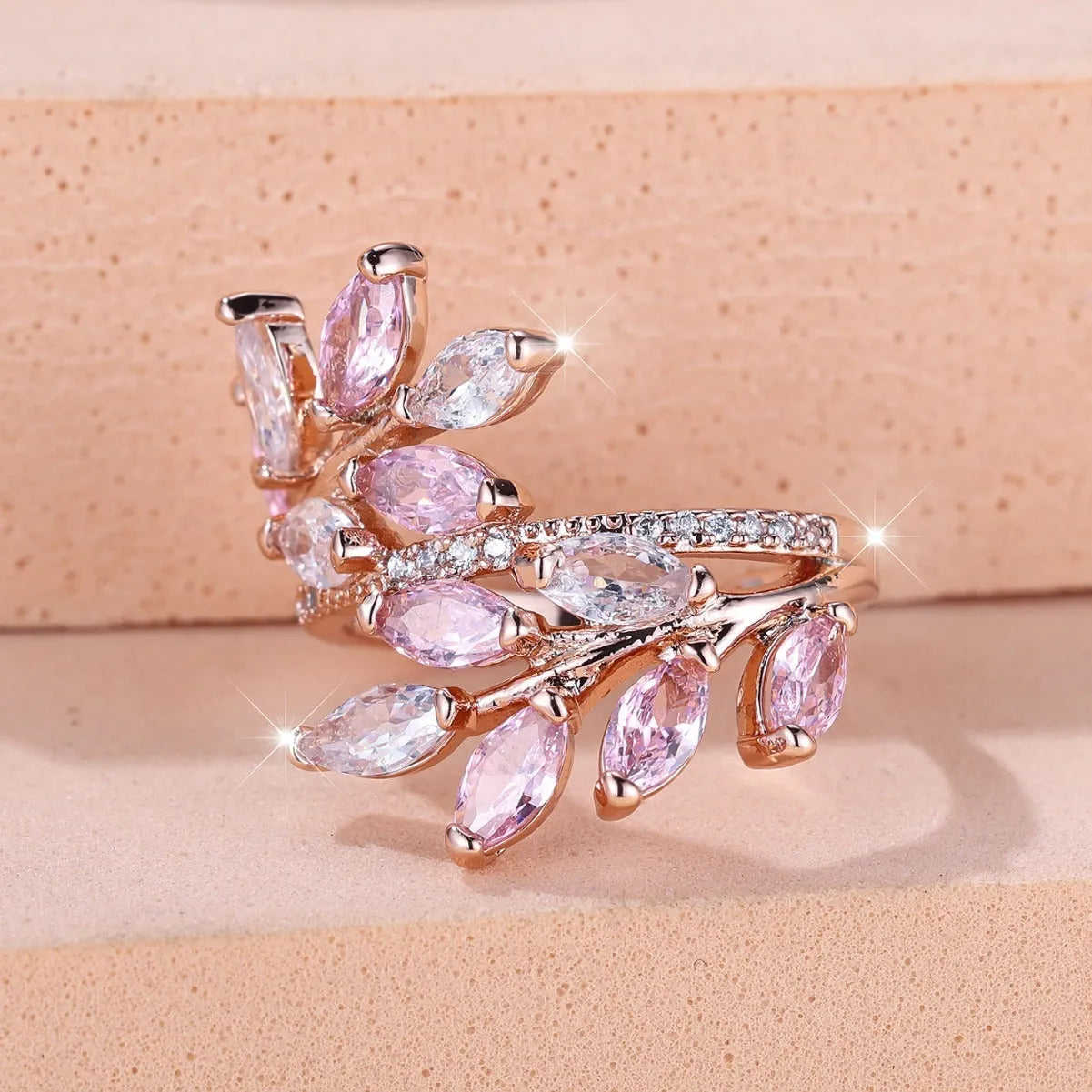 Adjustable copper ring with horse eye zircon leaf design in rose gold sapphire blue colour
