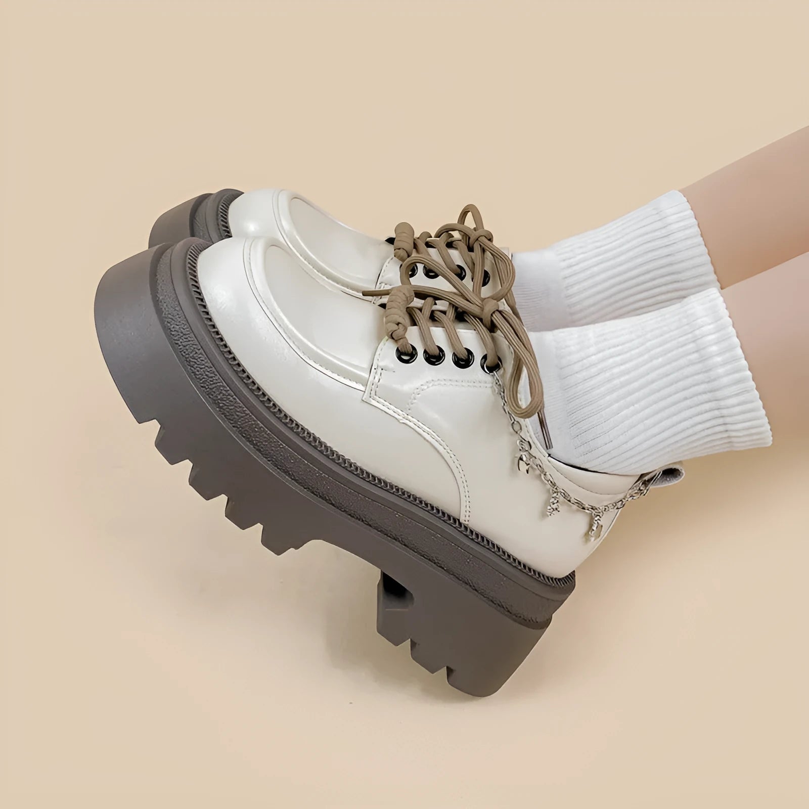 White platform leather Mary Jane shoes with round toe, lace-up front, and a thick 6-8cm chunky heel.