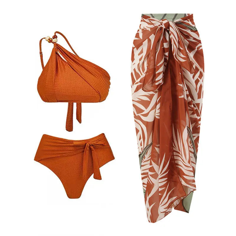 Women's high-waisted push-up swimsuit with brown chiffon dress cover-up showing split skirt design