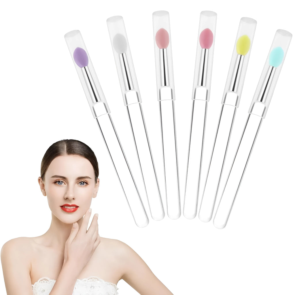 Set of reusable silicone lip brushes with protective caps in eight different colours: blue, pink, purple, red, rose red, skin colour, white, and yellow.
