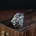 Personalised silver open ring with a diamond-patterned jibeast or animal zodiac design.
