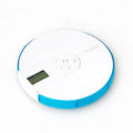 7-compartment alarm clock pill dispenser in multiple colours showing timer display and storage sections.