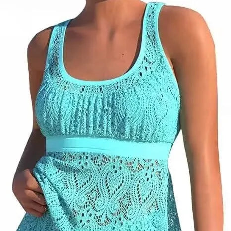 Conservative women's two-piece swimsuit in solid colour with sleeveless top and briefs
