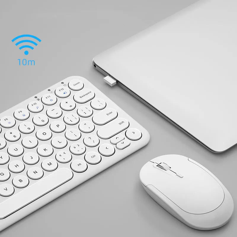 Ultra-thin wireless keyboard and mouse set in black colour on desk