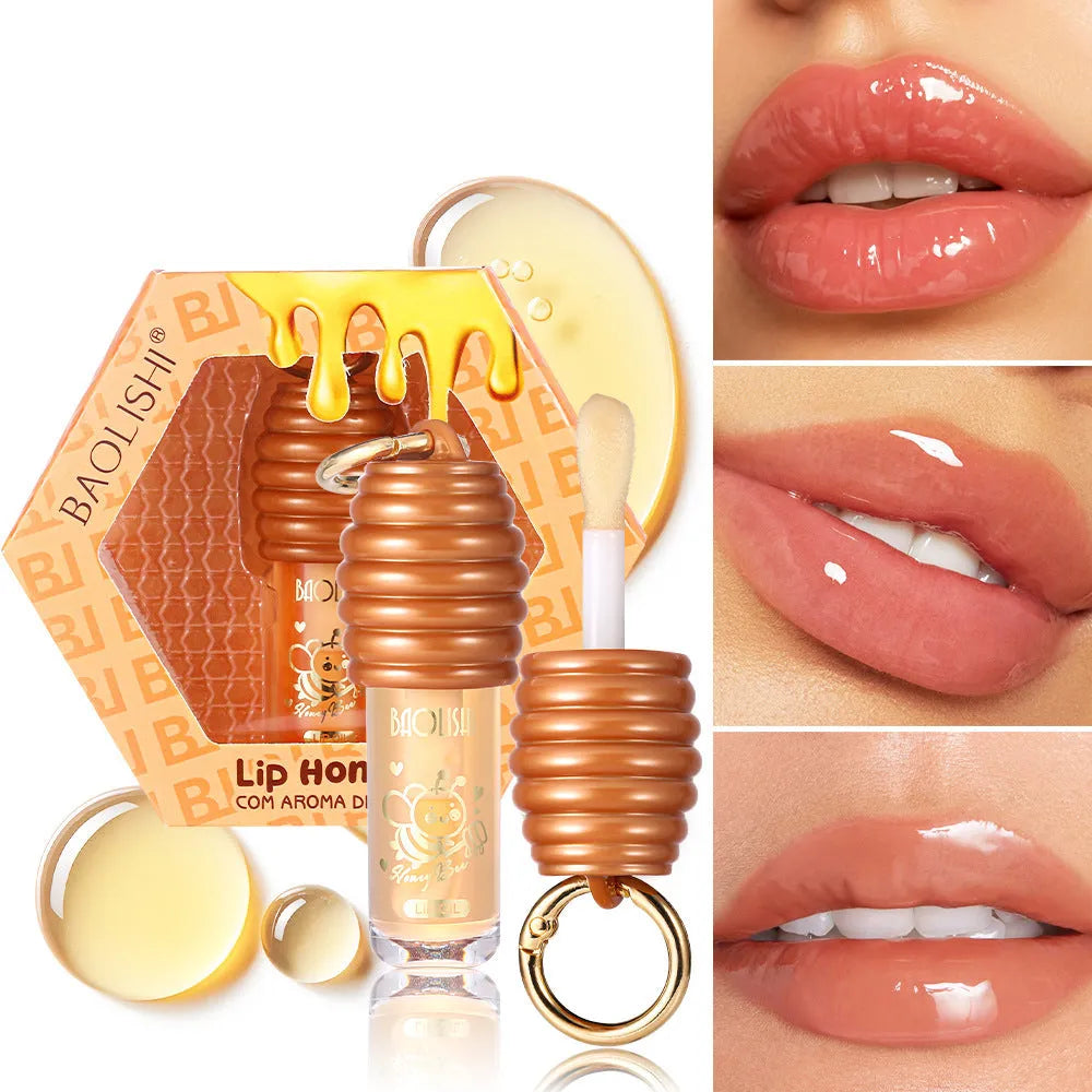 Honey lip gloss with keychain attachment for portable lip moisturising