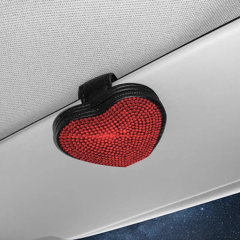 Diamond decorated PU leather magnetic clip for car sun visor holding sunglasses.