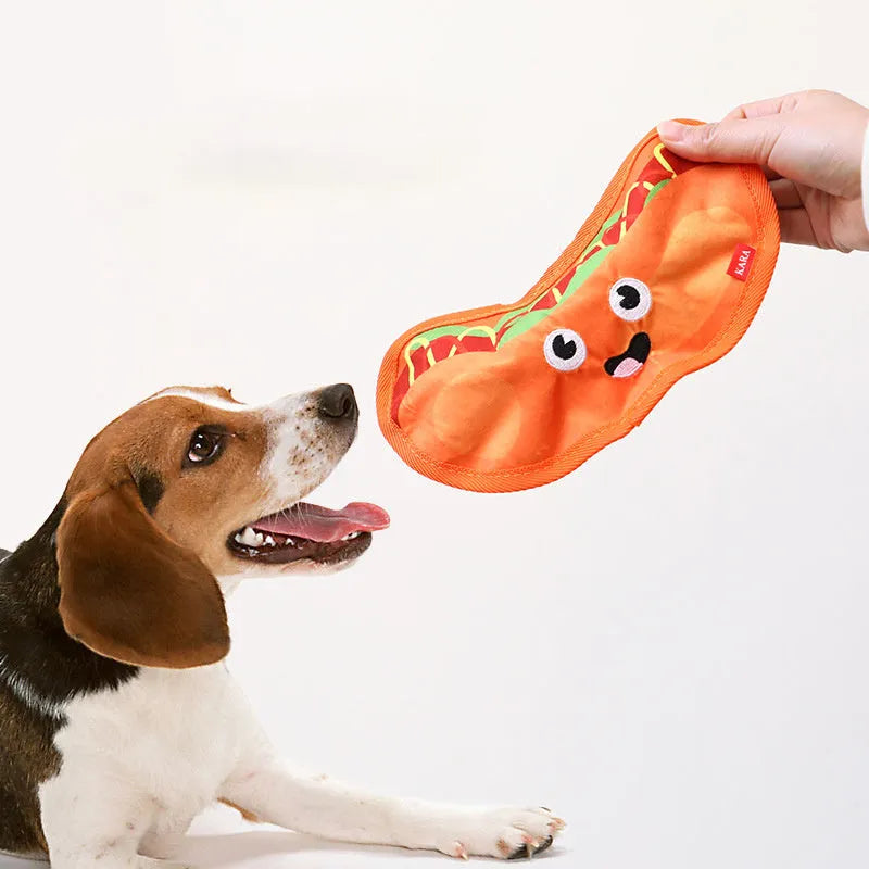 Food shaped dog chew toys with crinkle and squeak sounds including hamburger, pizza, hot dog and fries designs