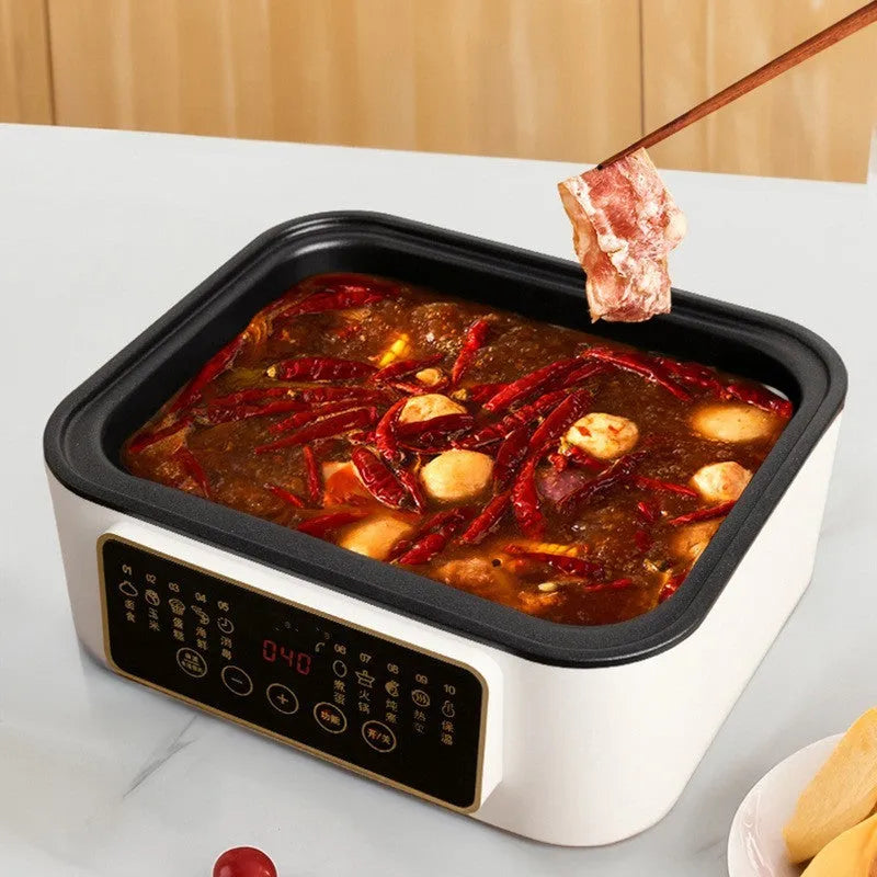 28-litre capacity automatic electric steamer with stainless steel rack on a kitchen counter.