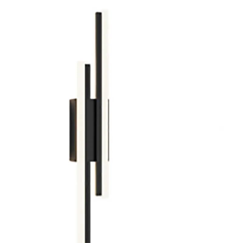 Scandinavian minimalist LED wall light with acrylic shade on black or gold arm.