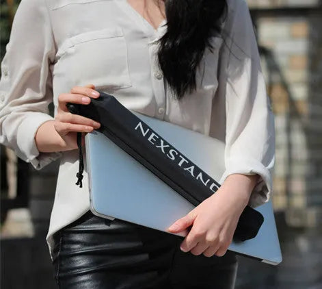 Black folding portable laptop stand with adjustable height, shown folded to 35.4cm size.