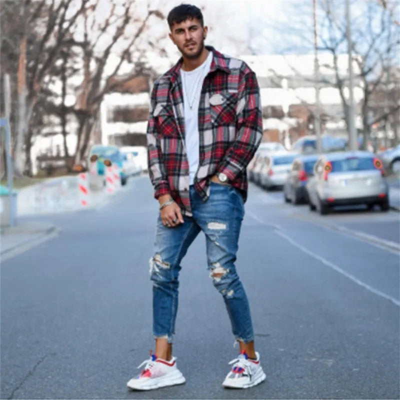 Men's deep blue ripped jeans with distressed hole detailing in 100% cotton fabric