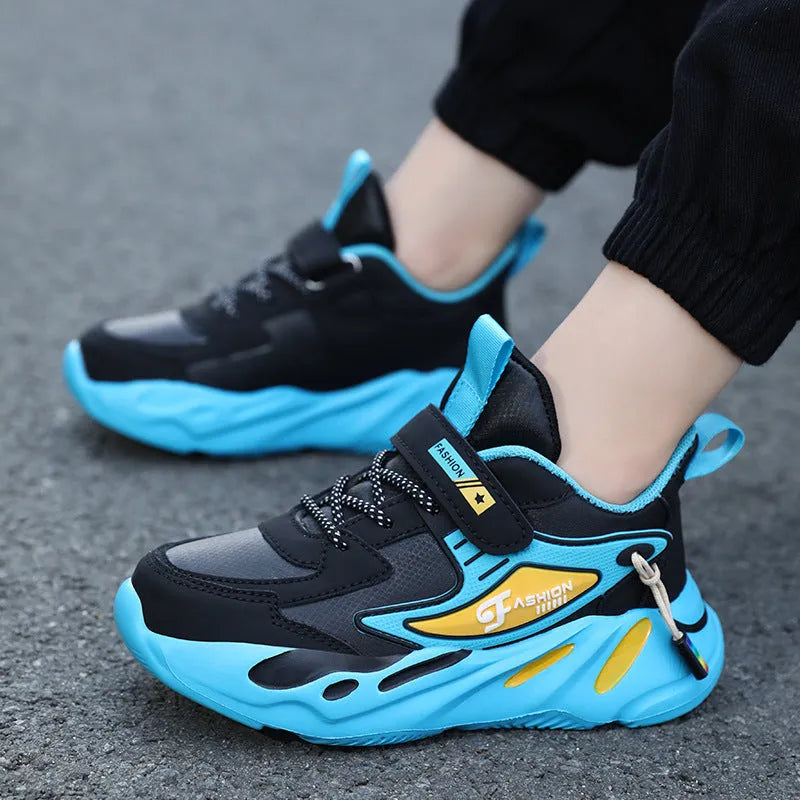 Boys' blue and black Velcro fastening sports shoes with a textured non-slip sole.