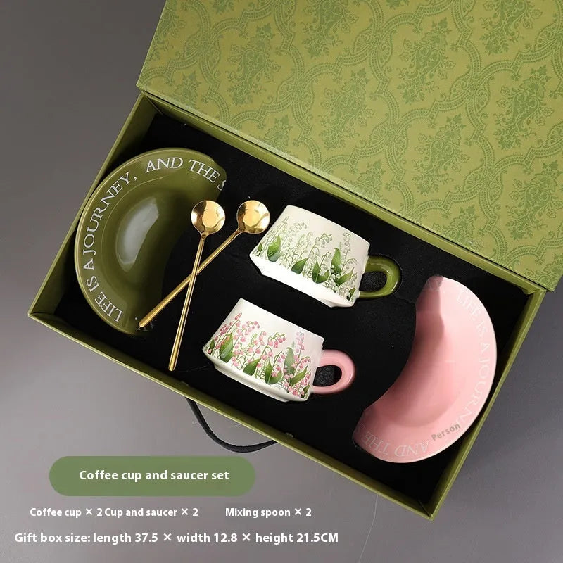 Ceramic coffee cup and saucer set for two with stirring spoons in Campanula design