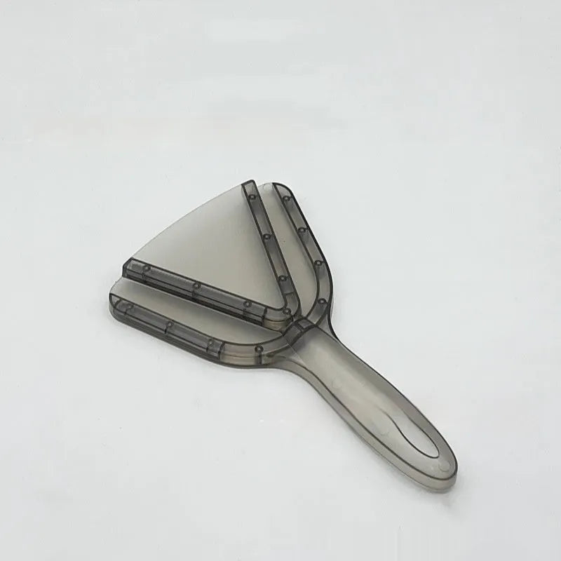 Red plastic can opener with telescopic bottle opener component extended for use