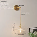 Retro brass wall lamp with lotus-shaped glass shade in choice of colours, mounted on a wall.