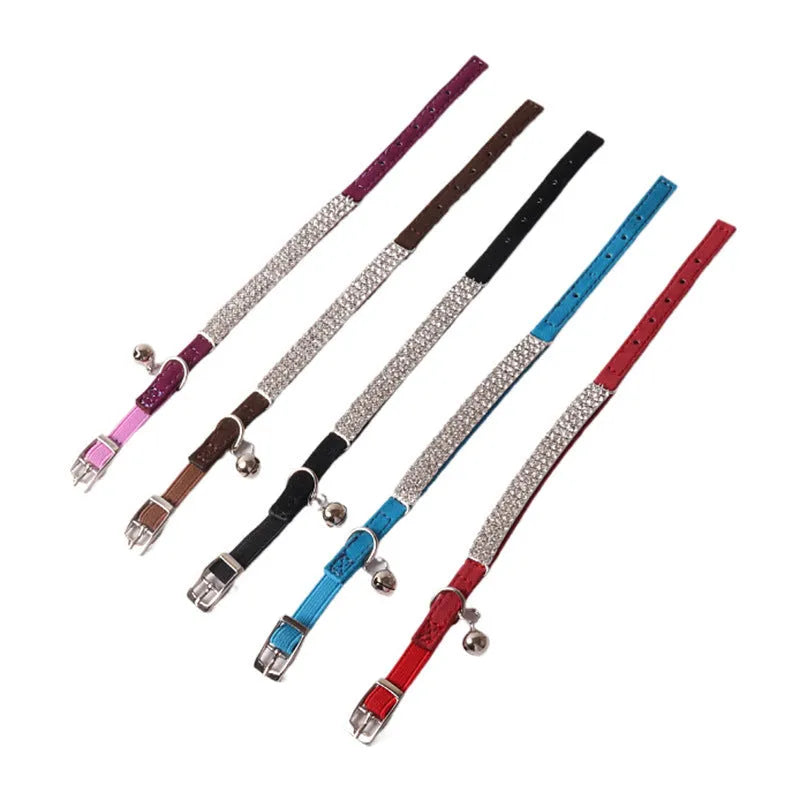 Soft flocking cat collar with elastic buckle in one of six colours on a white background.