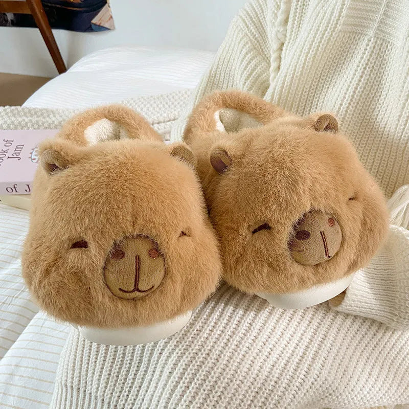 Light brown women's plush winter slippers with cartoon pattern, artificial wool lining and PVC soles