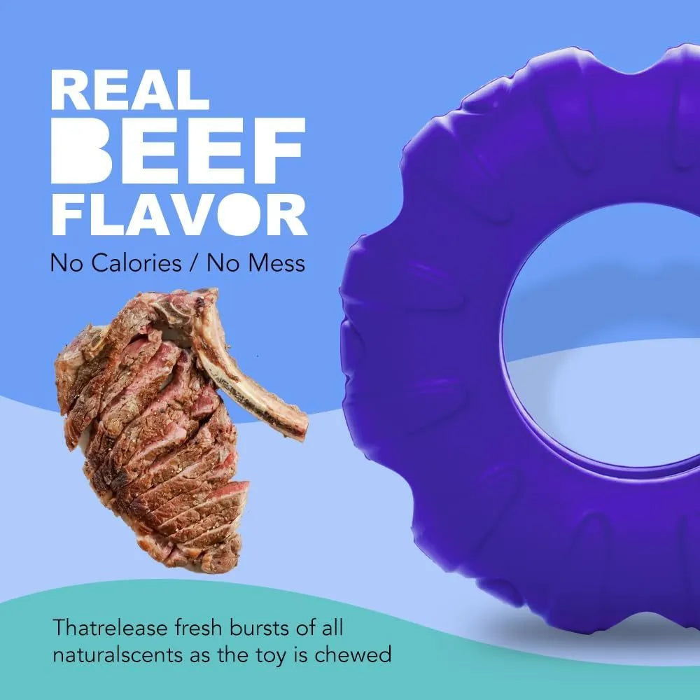 Blue beef-flavoured rubber tyre dog toy with oval holes for treat dispensing