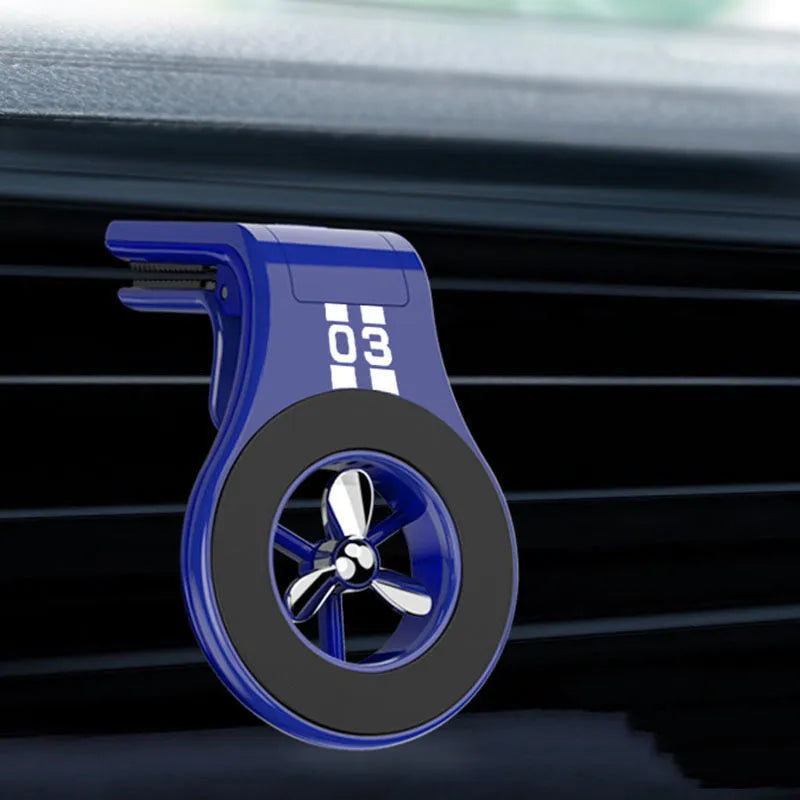 Black magnetic car air vent phone holder with adjustable angle and built-in perfume diffuser.