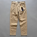 Men's straight-leg casual cotton trousers in army green colour on a mid-waist fit model.