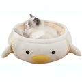 Green dinosaur and chick shaped cat bed that can be used flat or hung as a hammock