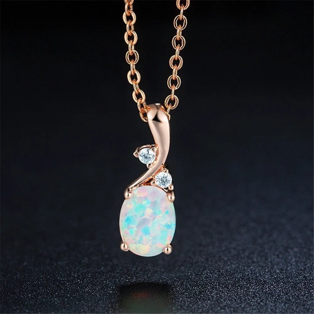 Water drop shaped opal pendant necklace on O-chain with rose gold or white electroplated finish