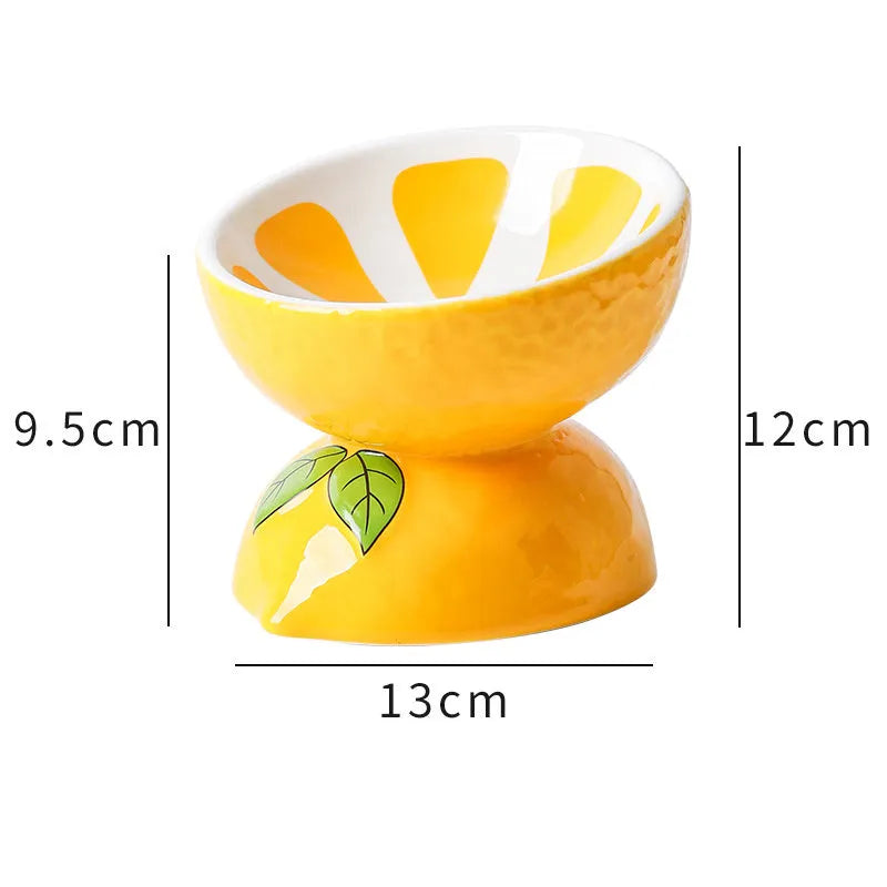 Ceramic raised cat bowl with tilted design and colourful fruit pattern