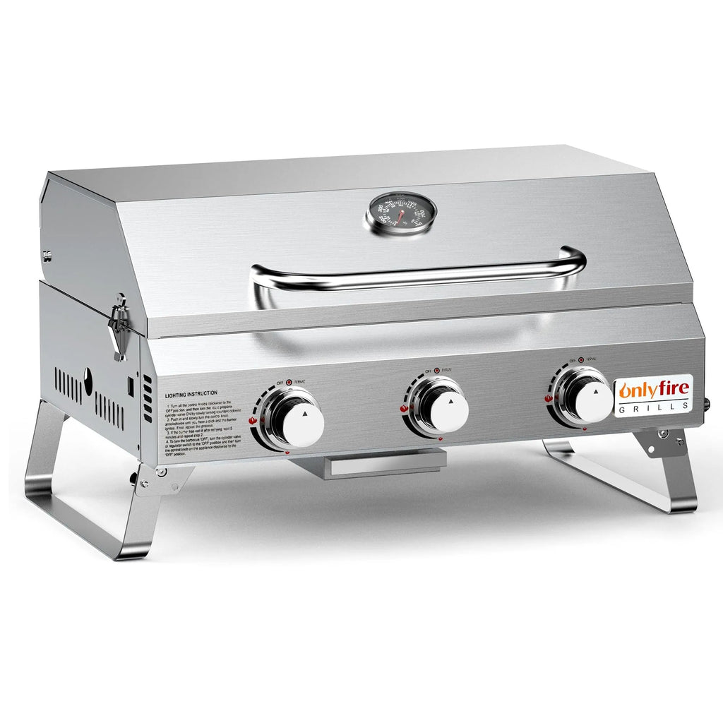 Silver stainless steel desktop gas barbecue grill with three burners and foldable legs.